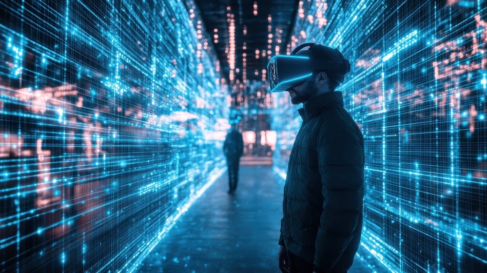 A man wearing virtual reality headset in data center environment 